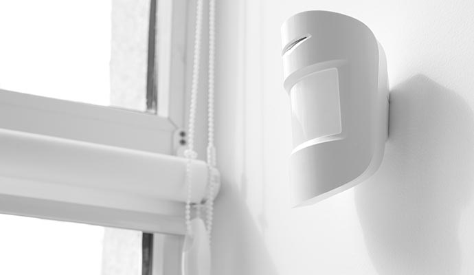 installed home security motion sensor
