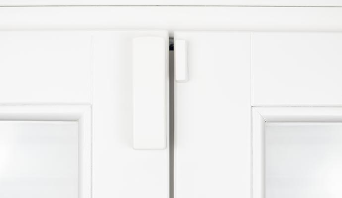 installed wireless alarm sensor for window and door